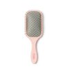 Front view of the pink TYMO Paddle Brush showing grey cushioned cushion pad and ball-tipped bristles against a plain white background.