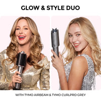 Two smiling women showing styled wavy hair with TYMO Airbeam and TYMO CurlPro grey tools