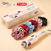 TYMO x Pingu CurlPro automatic curling iron set with packaging box and matching scrunchies.